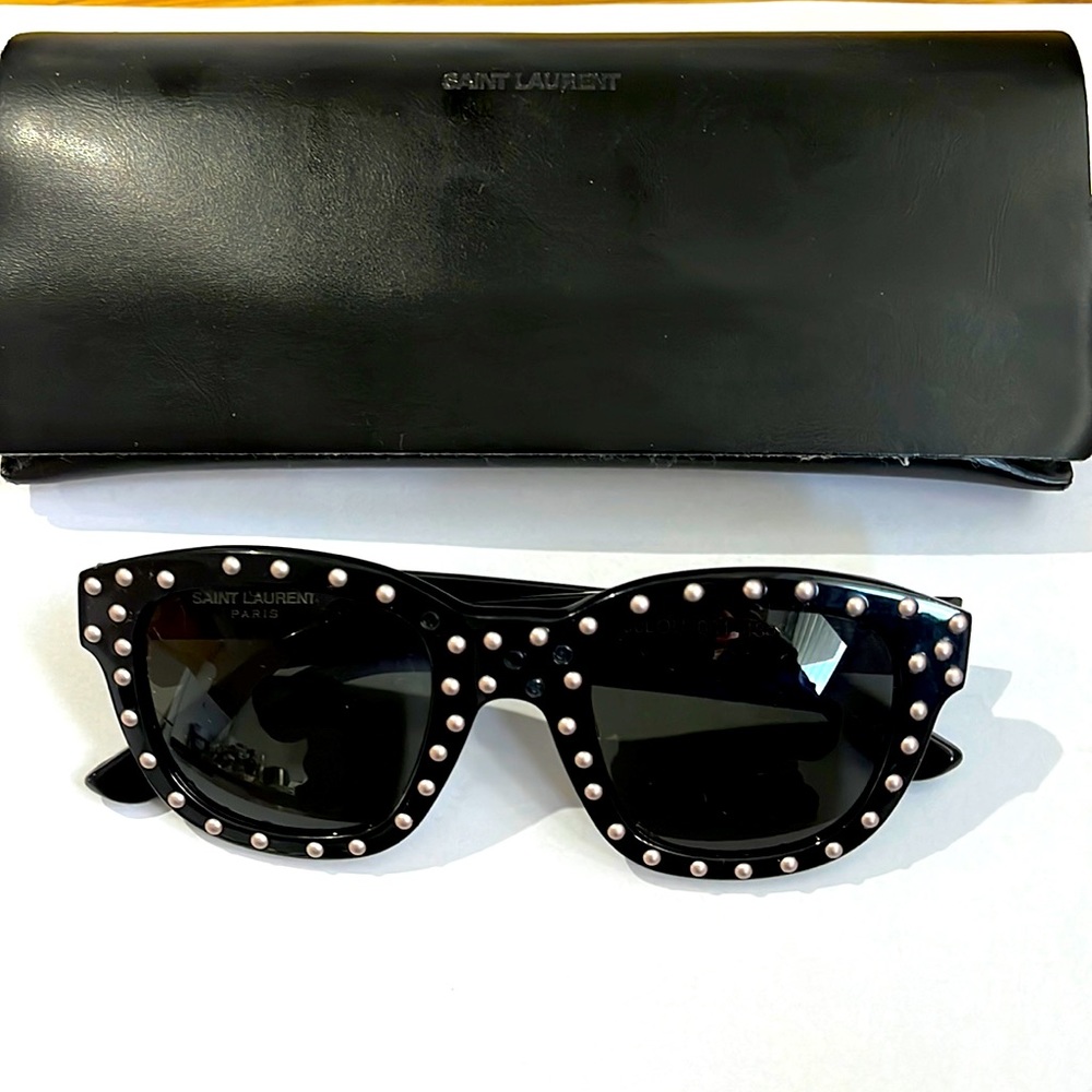 Saint Laurent iconic sunglasses as worn by Lady Gaga. Black acetate w/studs